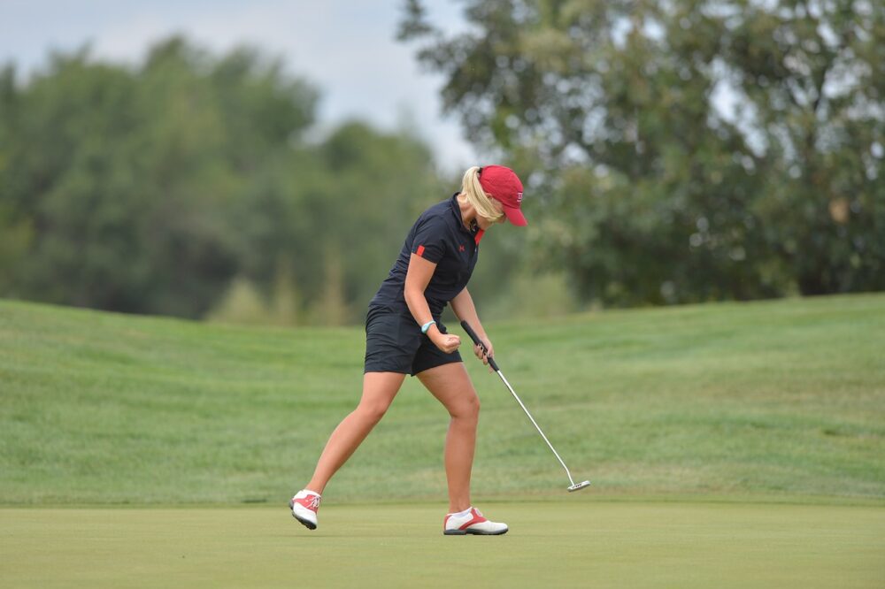 Female-golfer-fist-pump