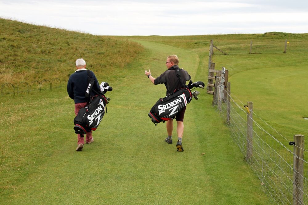 two-golfers-on-the-move