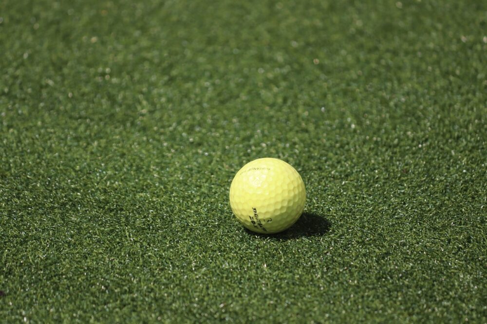 yellow-golf-ball-on-the-green